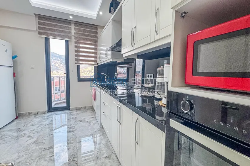 Kupuj  Apartament 3+1 na zezwolenie na pobyt w Alanyi, dzielnica Kale - umeblowany i z panoramicznym widokiem na morze i port  11 