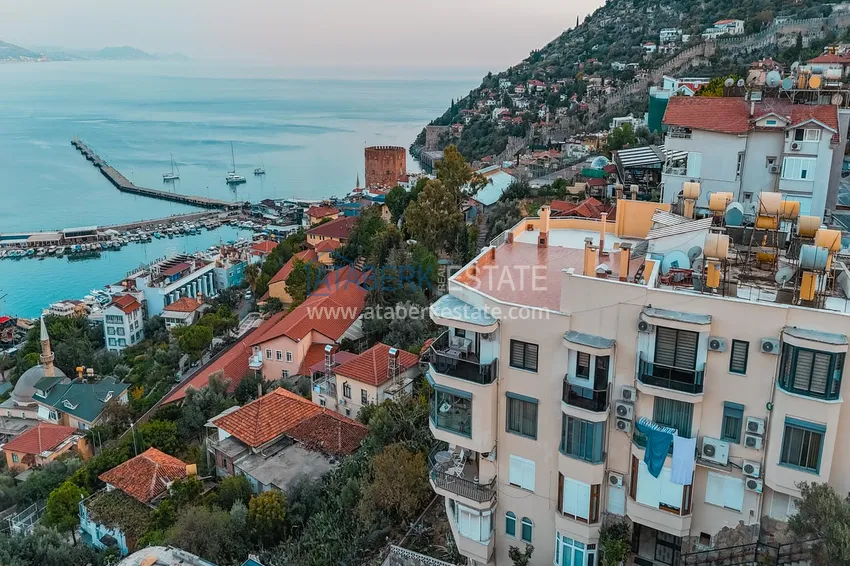 Apartament 3+1 na zezwolenie na pobyt w Alanyi, dzielnica Kale - umeblowany i z panoramicznym widokiem na morze i port  1 