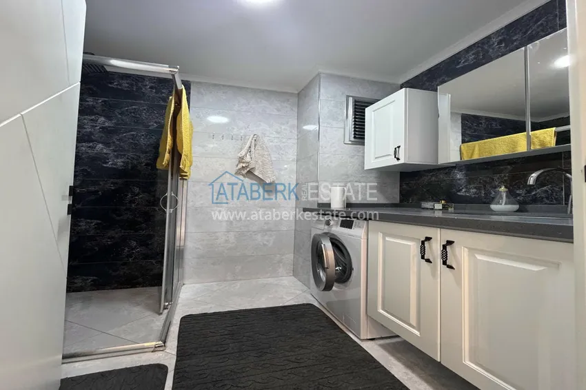 Kupuj  1+1 umeblowane mieszkanie w Alanya, Kestel - 150 m do morza, przeszklony balkon  10 