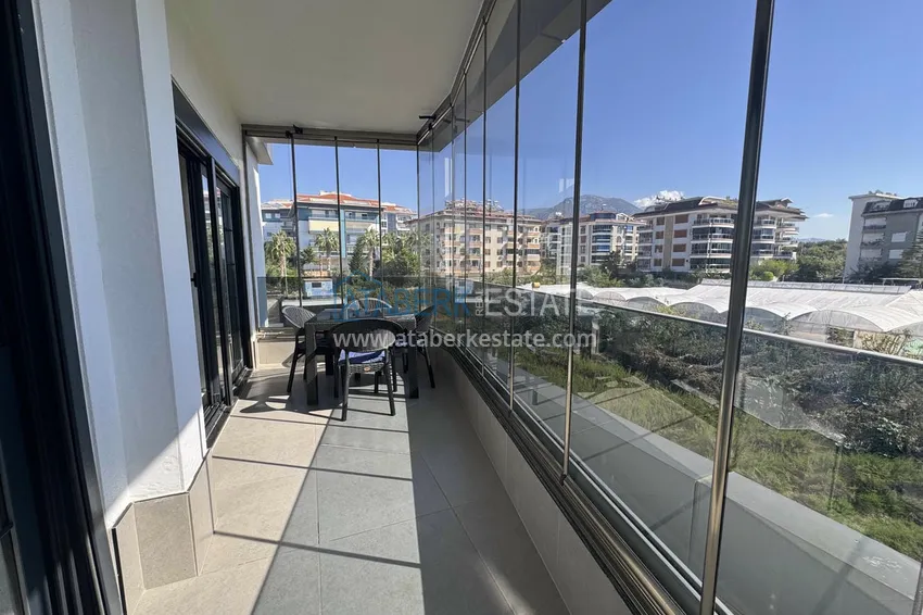 Kupuj  1+1 umeblowane mieszkanie w Alanya, Kestel - 150 m do morza, przeszklony balkon  11 