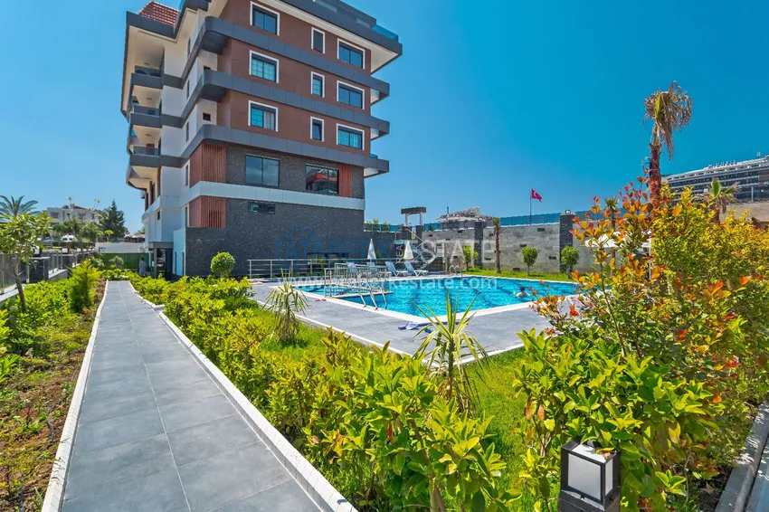 1+1 umeblowane mieszkanie w Alanya, Kestel - 150 m do morza, przeszklony balkon  1 