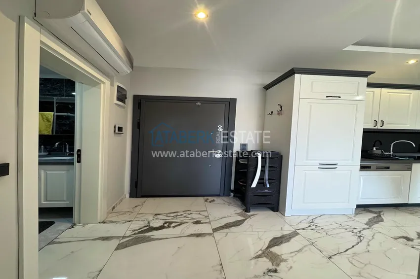 Kupuj  1+1 umeblowane mieszkanie w Alanya, Kestel - 150 m do morza, przeszklony balkon  1 
