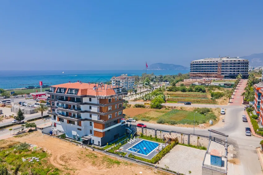 1+1 umeblowane mieszkanie w Alanya, Kestel - 150 m do morza, przeszklony balkon  2 