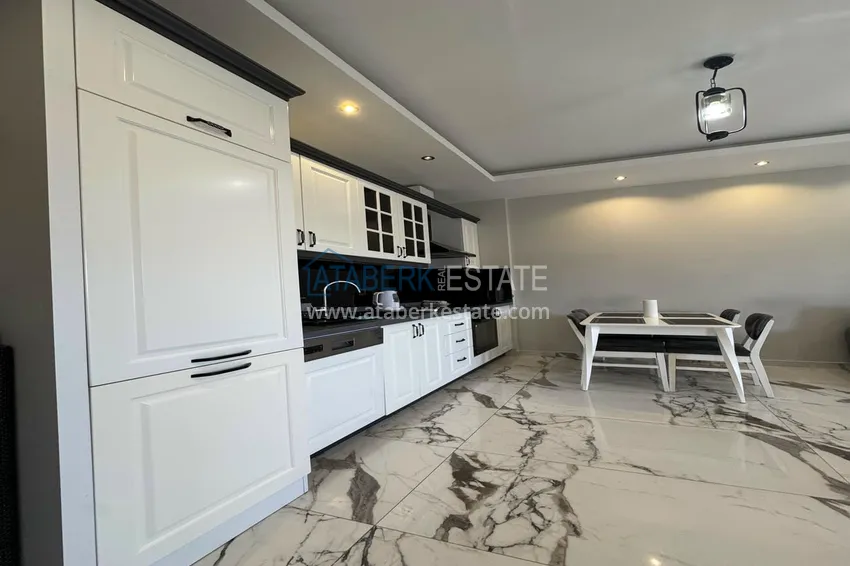 Kupuj  1+1 umeblowane mieszkanie w Alanya, Kestel - 150 m do morza, przeszklony balkon  2 
