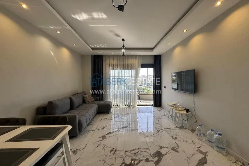 Kupuj  1+1 umeblowane mieszkanie w Alanya, Kestel - 150 m do morza, przeszklony balkon  4 