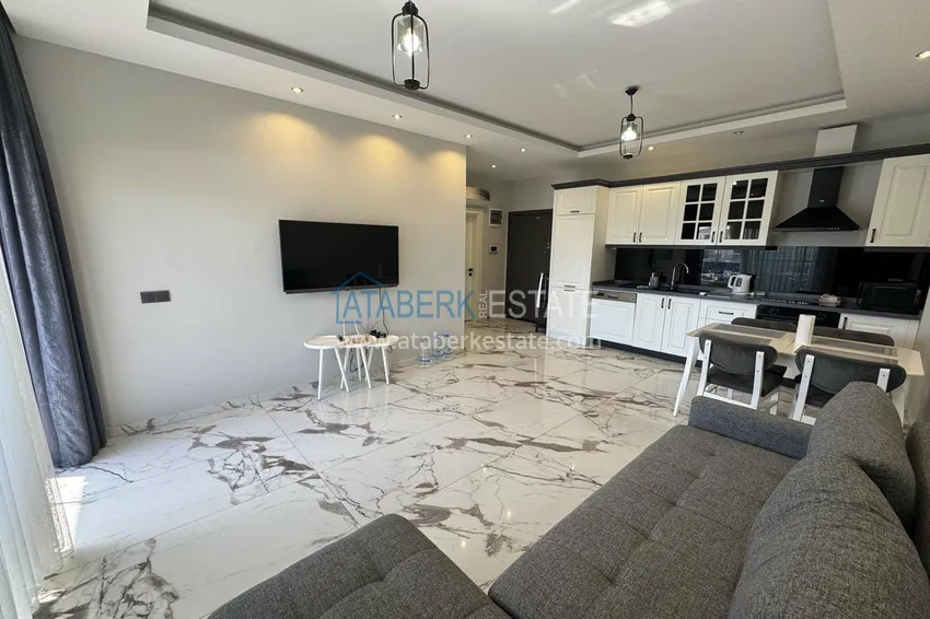 Kupuj  1+1 umeblowane mieszkanie w Alanya, Kestel - 150 m do morza, przeszklony balkon  7 