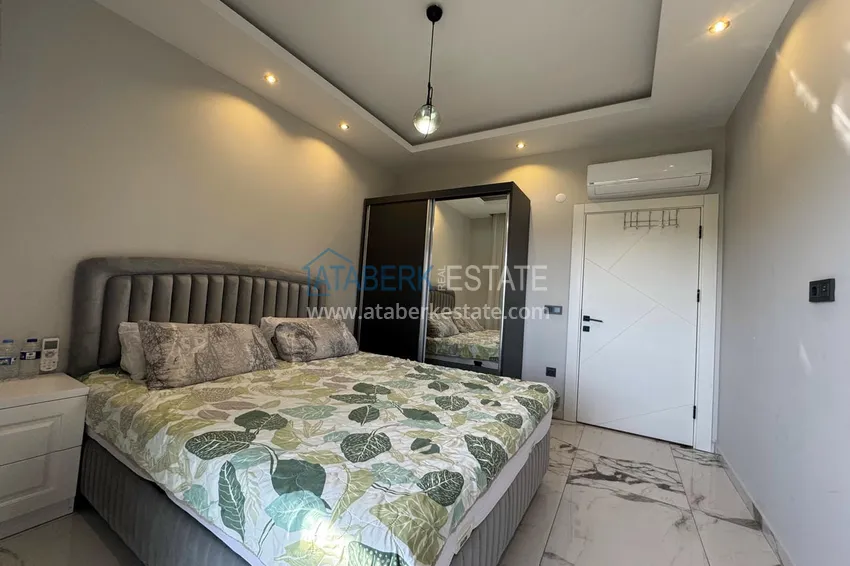 Kupuj  1+1 umeblowane mieszkanie w Alanya, Kestel - 150 m do morza, przeszklony balkon  9 