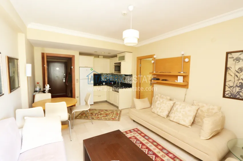 Kupuj  Apartament 1+1 w słynnym stylu kurortu - w pełni umeblowane w Mahmutlar 1 