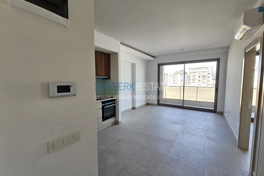 Kupuj  Apartament 1+1 w Kestel 200 metrów od morza - z widokiem na morze i góry  1 