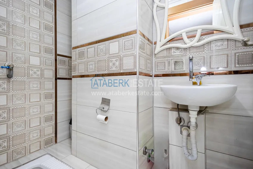 Kupuj  Jednopoziomowy apartament 3+1 z meblami w centrum Alanyi, Hasbahce — nieruchomość na pozwolenie na pobyt i obywatelstwo  15 