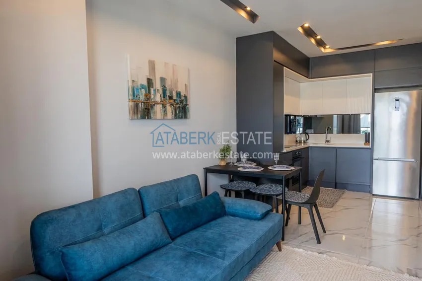 Kupuj  Jednopokojowy apartament z nowymi meblami w centrum Mahmutlar, Sobotnia Dzielnica Targowa 10 