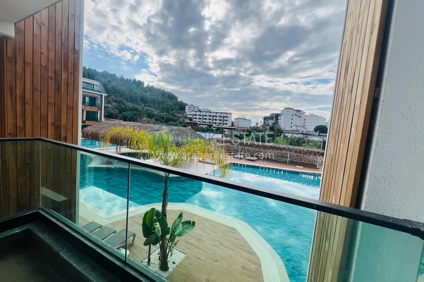 Kupuj  Apartament dwupoziomowy 2+1 w Konakli - z tarasem przy basenie w elitarnej rezydencji 11 