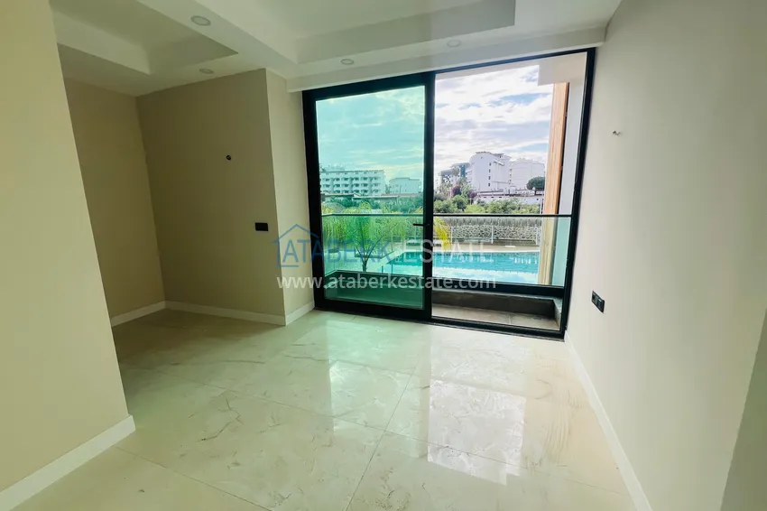 Kupuj  Apartament dwupoziomowy 2+1 w Konakli - z tarasem przy basenie w elitarnej rezydencji 9 