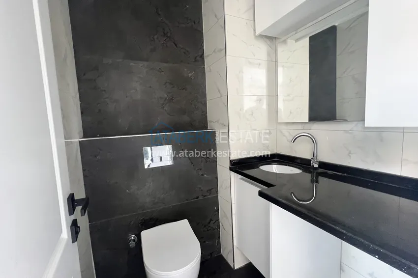 Kupuj  Duplex 2+1 w Kargicak, 250 metrów od plaży - dwupoziomowy penthouse z widokiem na morze 13 