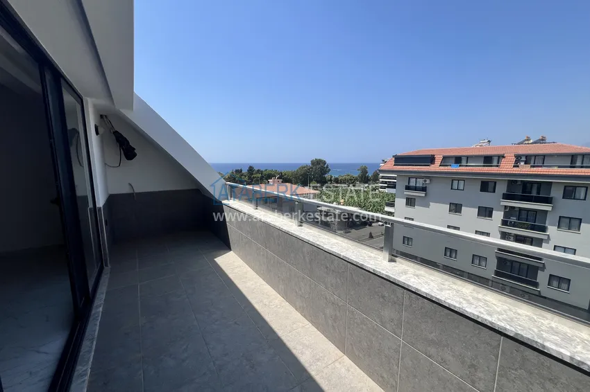 Kupuj  Duplex 2+1 w Kargicak, 250 metrów od plaży - dwupoziomowy penthouse z widokiem na morze 16 