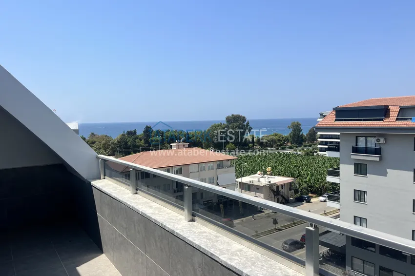 Kupuj  Duplex 2+1 w Kargicak, 250 metrów od plaży - dwupoziomowy penthouse z widokiem na morze 17 
