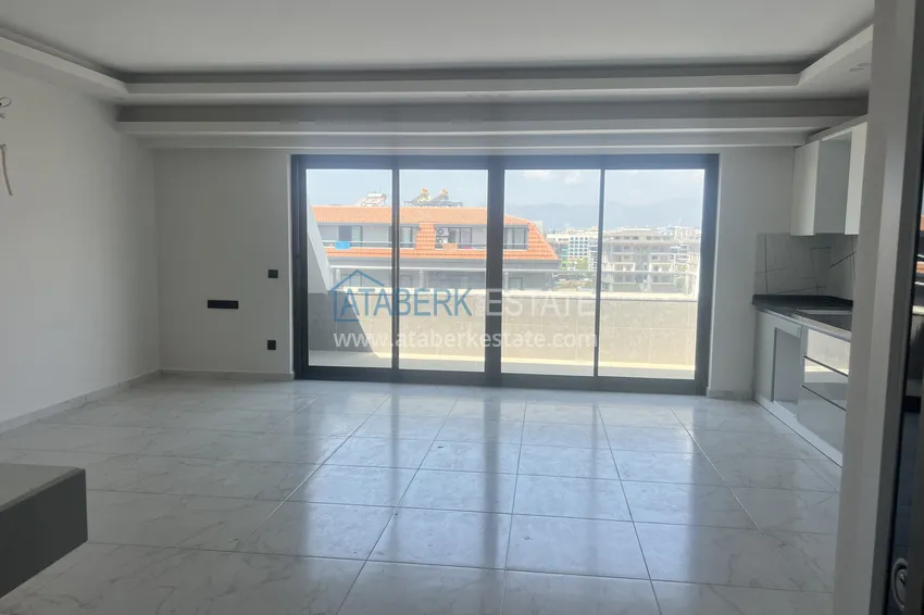 Kupuj  Duplex 2+1 w Kargicak, 250 metrów od plaży - dwupoziomowy penthouse z widokiem na morze 2 