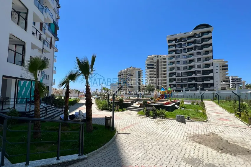 Dobra cena! Apartament 1+1 w Mahmutlar — obiekt na podstawie zezwolenia na pobyt z widokiem na góry   14 