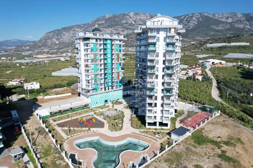 Dobra cena! Apartament 1+1 w Mahmutlar — obiekt na podstawie zezwolenia na pobyt z widokiem na góry   1 