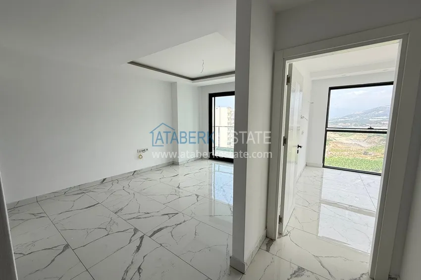 Kupuj  Dobra cena! Apartament 1+1 w Mahmutlar — obiekt na podstawie zezwolenia na pobyt z widokiem na góry   2 