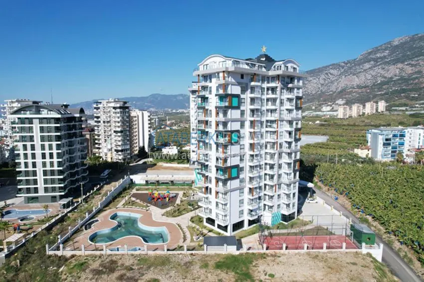 Dobra cena! Apartament 1+1 w Mahmutlar — obiekt na podstawie zezwolenia na pobyt z widokiem na góry   3 