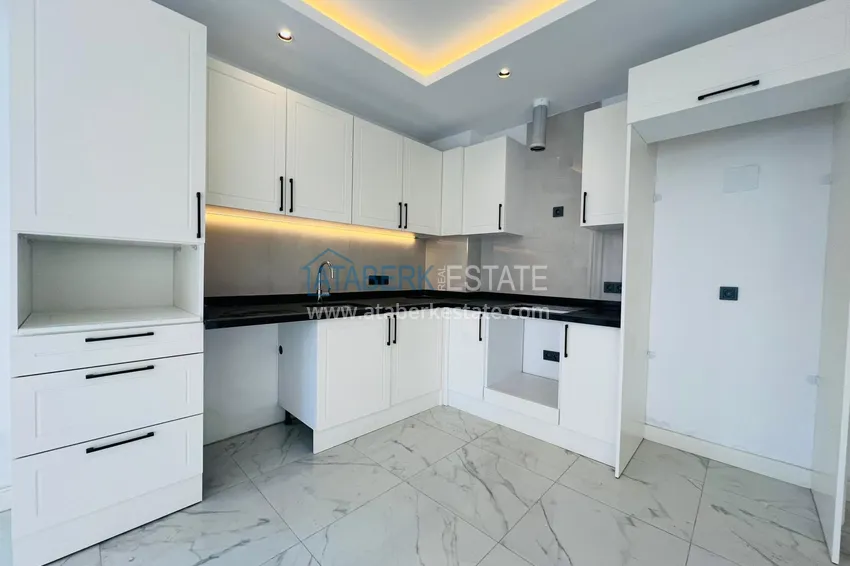 Kupuj  Apartament 2+1 od inwestora w kompleksie w budowie, centrum Alanyi — plaża Kleopatra 4 