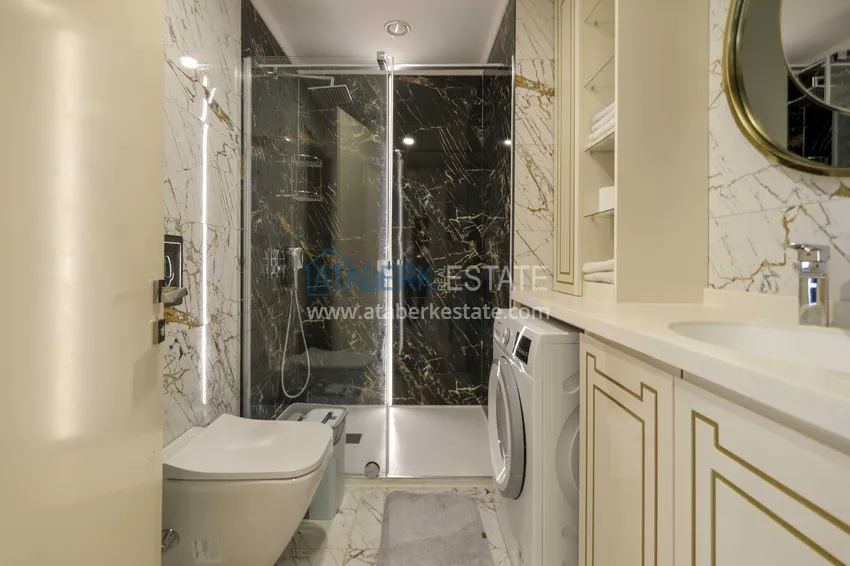 Kupuj  Apartament 1+1 przy plaży w Mahmutlar — umeblowany i z panoramicznym widokiem na morze 10 
