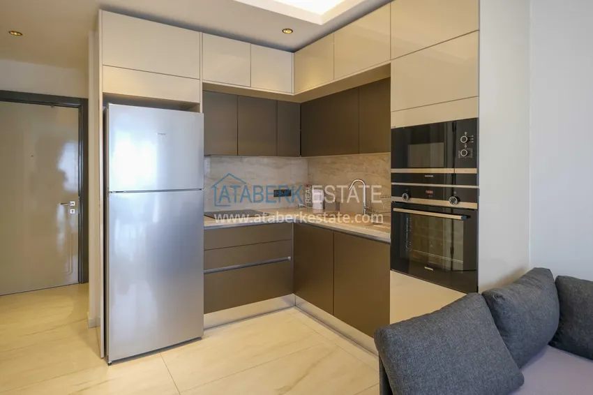 Kupuj  Apartament 1+1 przy plaży w Mahmutlar — umeblowany i z panoramicznym widokiem na morze 2 