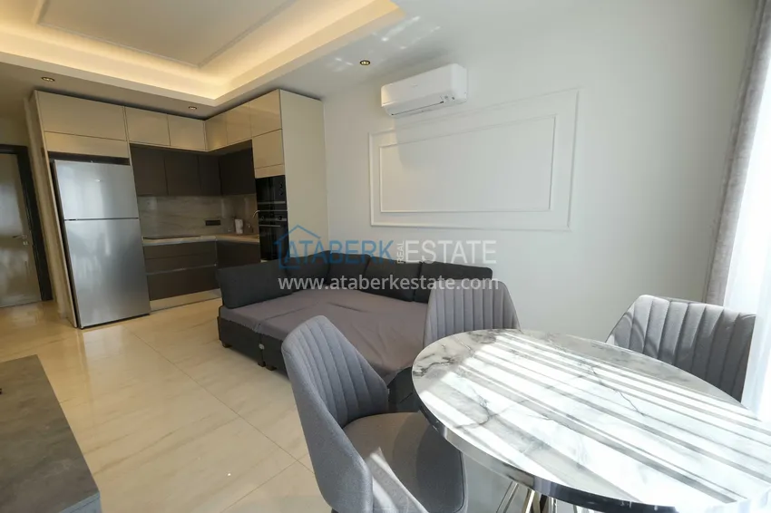 Kupuj  Apartament 1+1 przy plaży w Mahmutlar — umeblowany i z panoramicznym widokiem na morze 3 