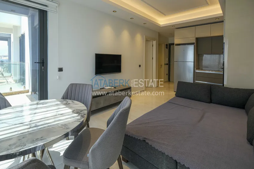 Kupuj  Apartament 1+1 przy plaży w Mahmutlar — umeblowany i z panoramicznym widokiem na morze 4 
