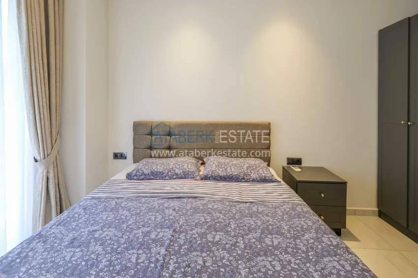 Kupuj  Apartament 1+1 przy plaży w Mahmutlar — umeblowany i z panoramicznym widokiem na morze 7 