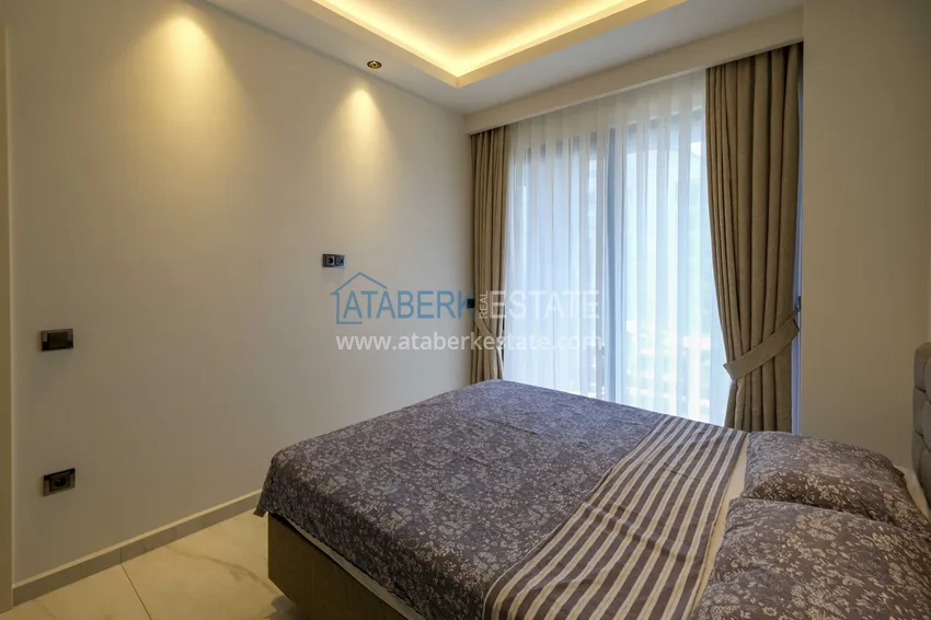 Kupuj  Apartament 1+1 przy plaży w Mahmutlar — umeblowany i z panoramicznym widokiem na morze 8 