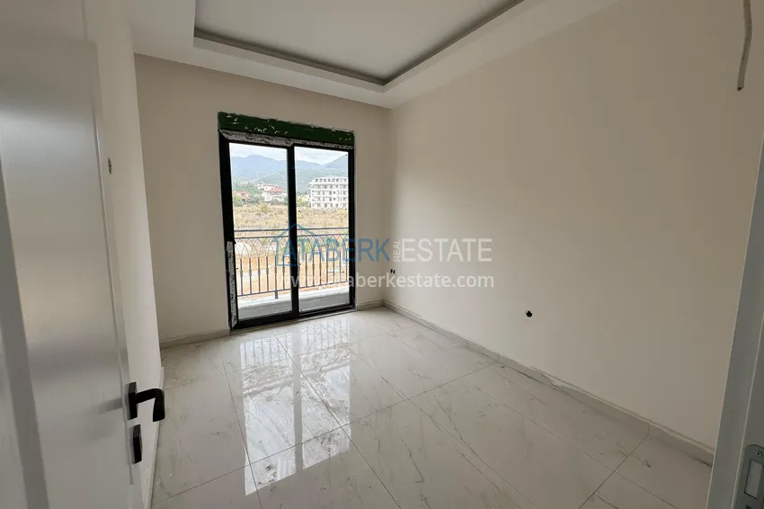Kupuj  Apartament 1+1 z widokiem na góry w Alanya, dzielnica Oba 7 