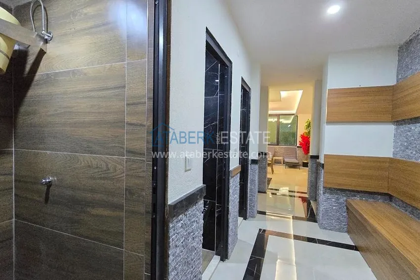 Apartamenty od dewelopera w Alanyi - nowoczesny kompleks mieszkalny w centrum Mahmutlar 14