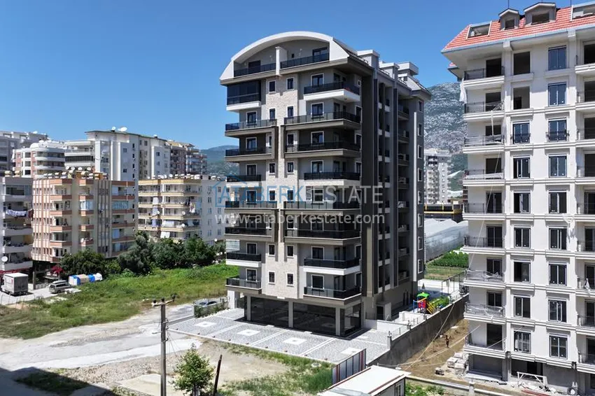 Apartamenty od dewelopera w Alanyi - nowoczesny kompleks mieszkalny w centrum Mahmutlar 4