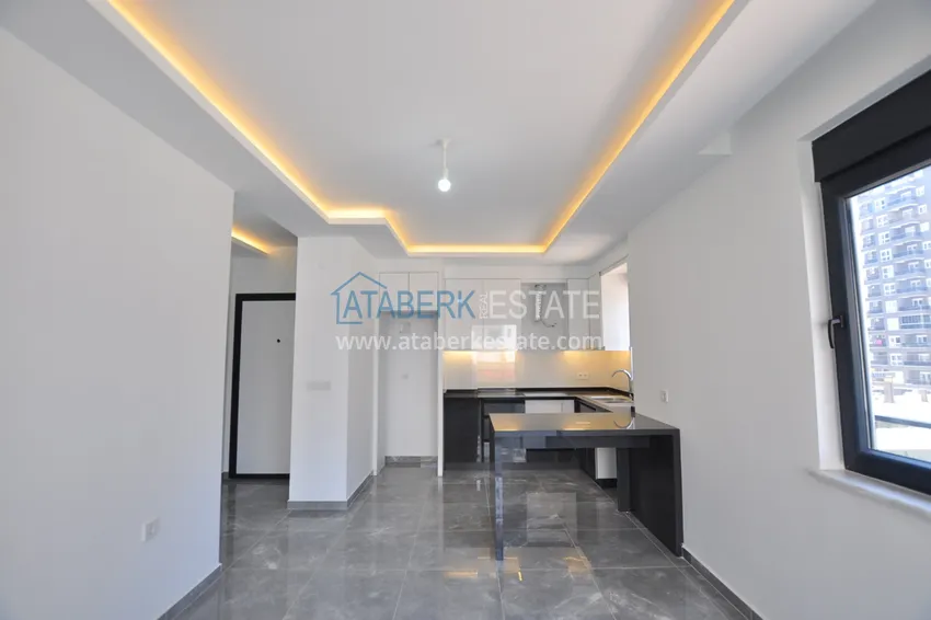 Kupuj Apartamenty od dewelopera w Alanyi - nowoczesny kompleks mieszkalny w centrum Mahmutlar 4
