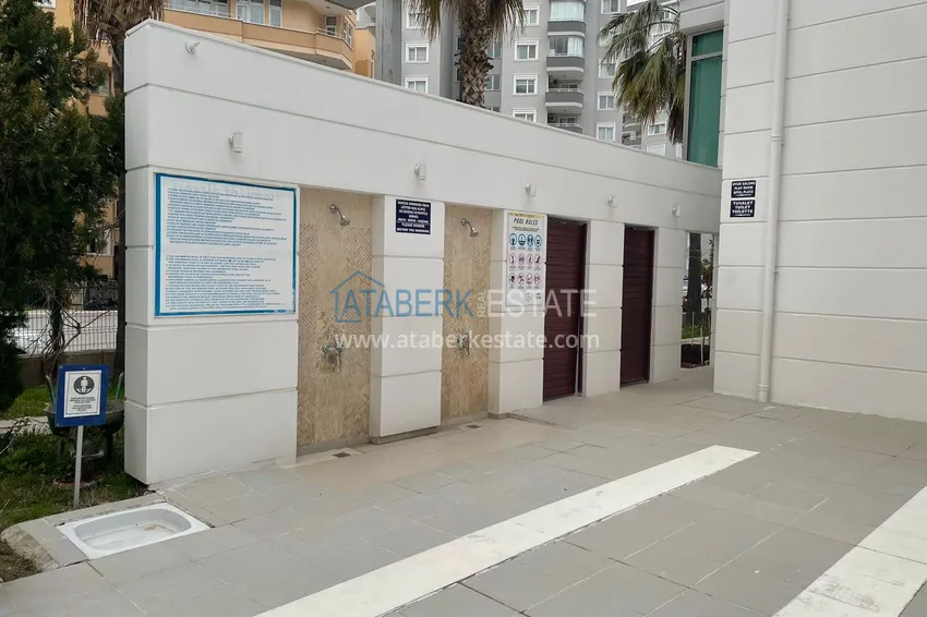 Apartament 2+1 z widokiem na morze w centrum Mahmutlar — meble, oddzielna kuchnia i przeszklony balkon 11 