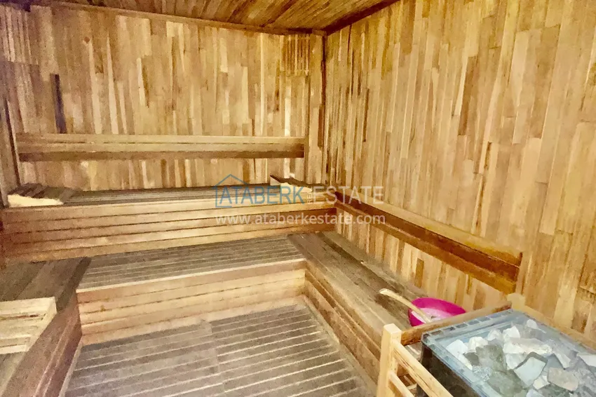 Apartament 2+1 z widokiem na morze w centrum Mahmutlar — meble, oddzielna kuchnia i przeszklony balkon 16 