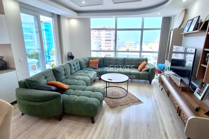 Apartament 2+1 w Mahmutlar — z luksusowymi meblami, przeszklonymi balkonami i widokiem na morze  1 