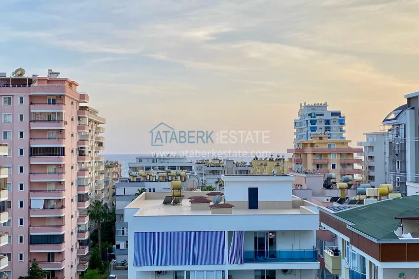 Apartament 2+1 w Mahmutlar — z luksusowymi meblami, przeszklonymi balkonami i widokiem na morze  2 
