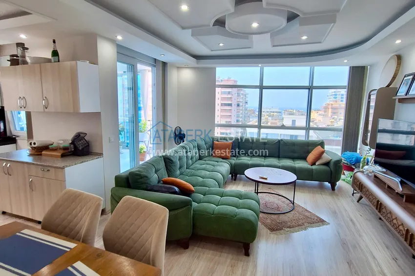 Kupuj  Apartament 2+1 w Mahmutlar — z luksusowymi meblami, przeszklonymi balkonami i widokiem na morze  4 