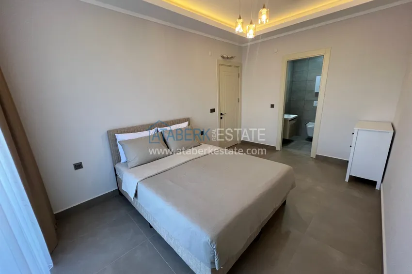 Kupuj  Wykończony apartament z dwiema sypialniami w kompleksie w budowie w Mahmutlar 14 