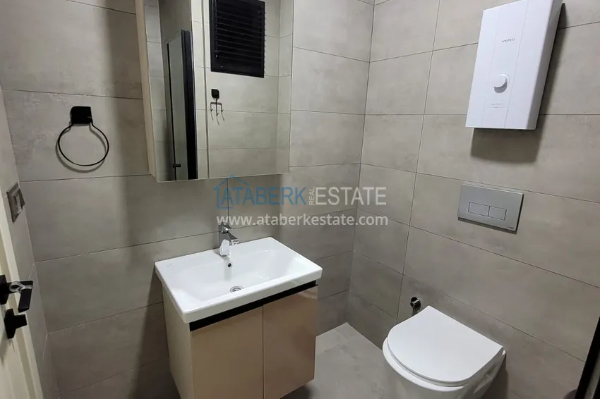 Kupuj  Wykończony apartament z dwiema sypialniami w kompleksie w budowie w Mahmutlar 17 