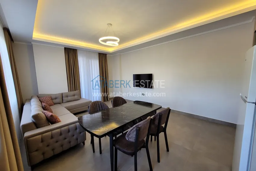 Kupuj  Wykończony apartament z dwiema sypialniami w kompleksie w budowie w Mahmutlar 5 