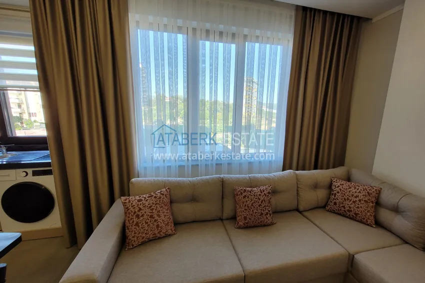 Kupuj  Wykończony apartament z dwiema sypialniami w kompleksie w budowie w Mahmutlar 6 