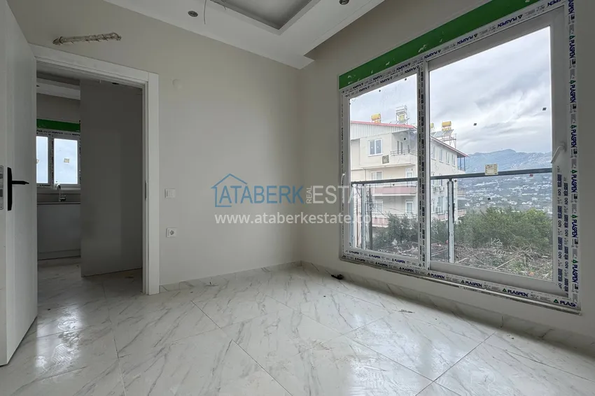 Kupuj  Nowy apartament 1+1 z widokiem na góry w Alanyi, dzielnica Górna Oba - Kizilcaşehir   10 