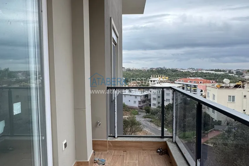 Kupuj  Nowy apartament 1+1 z widokiem na góry w Alanyi, dzielnica Górna Oba - Kizilcaşehir   12 