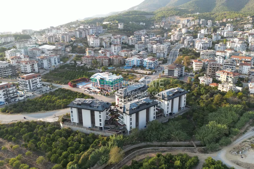 Dwupoziomowy penthouse 3+1 w okolicy Upper Oba - umeblowany i z widokiem na góry  1 