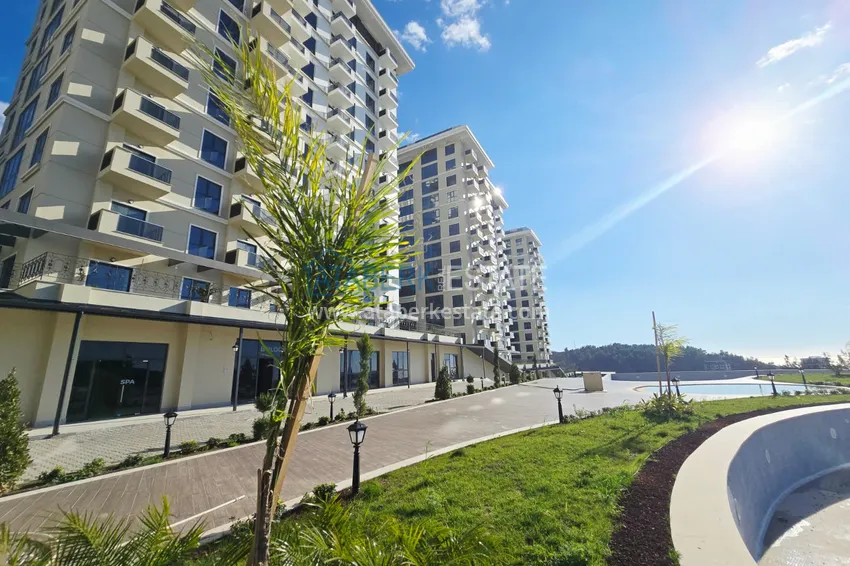 Oferta inwestorska: Apartament z jedną sypialnią i widokiem na góry w kompleksie premium — Alanya, Mahmutlar 7 
