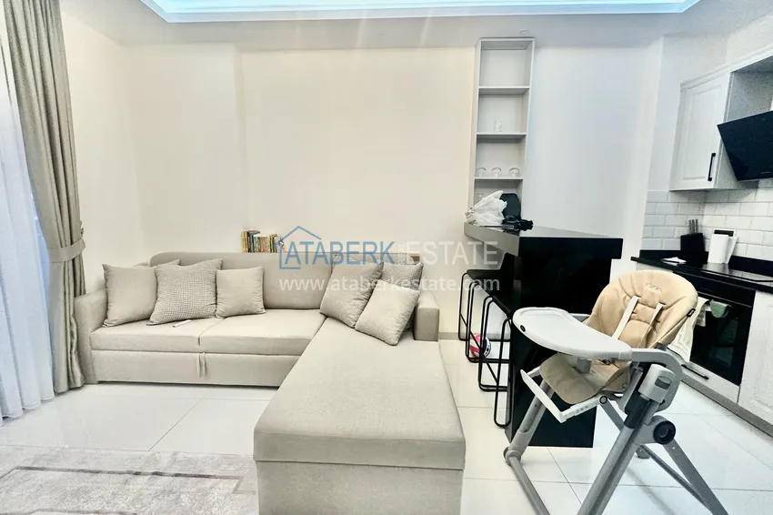 Kupuj  Apartament z jedną sypialnią w Alanya, dzielnica Oba - umeblowany i z przeszklonym balkonem  2 